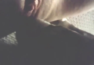 Black dog is going to work its tongue across vag